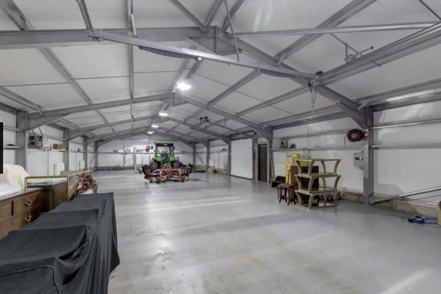 The traditional barn comprises a store room and garage, with a garage/machinery shed and workshop. It leads to a kennel and dog run.