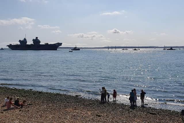 HMS Queen Elizabeth arrives back in Portsmouth at around 2pm on September 13 2020. Picture: Habibur Rahman