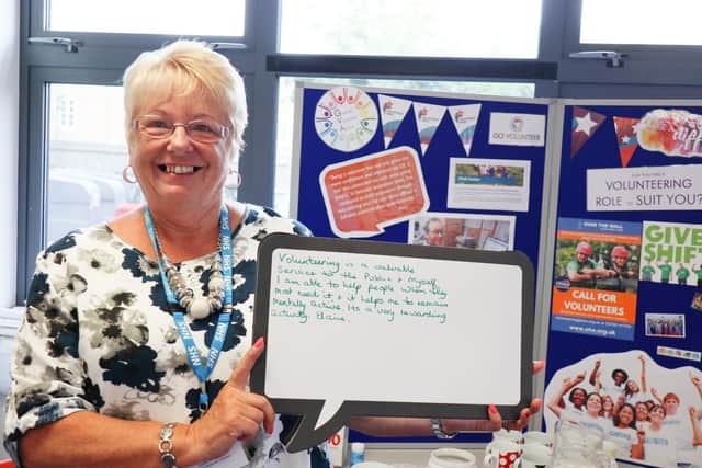 Gosport Voluntary Action's Community Compass and its dedicated team of
volunteers offer free confidential signposting consultations for those in need. Pictured: Volunteer Elaine Nash at last year's Volunteer's Week