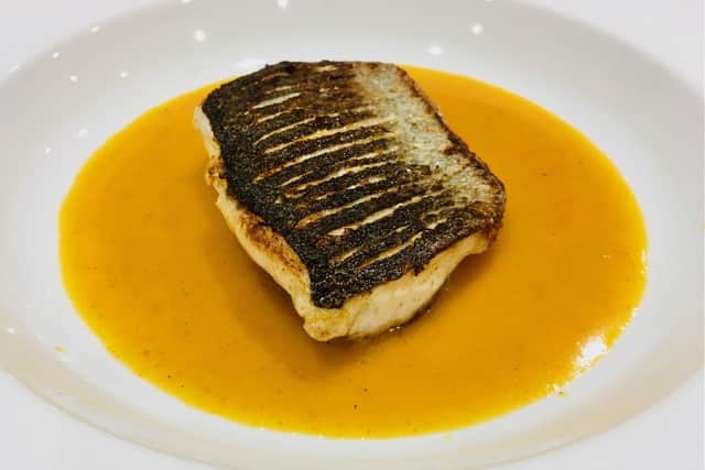 Sea bass in a curried clementine sauce.