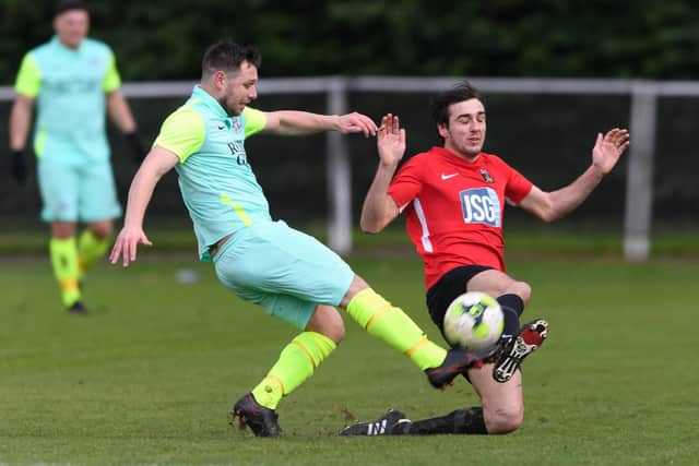 Curt Robbins, right, suffered a groin injury in Fareham's FA Vase win at Helston Athletic. Picture: Keith Woodland
