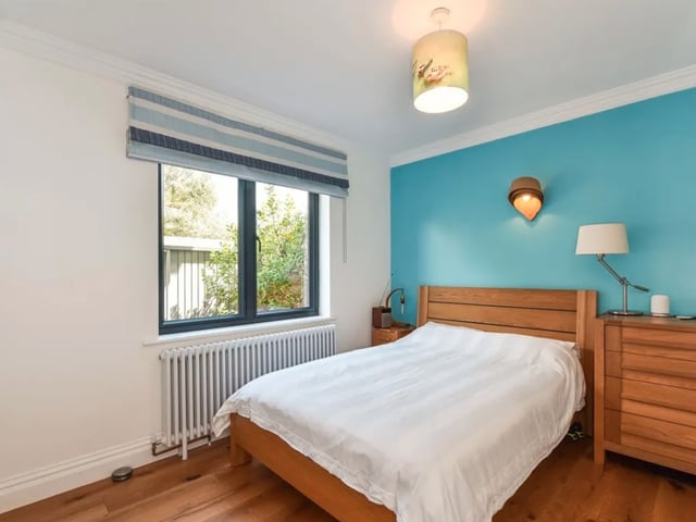 This property comes with five bedrooms, four bathrooms and two reception rooms as well as a large garden and a swimming pool.