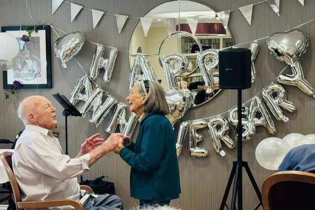 Maurice and Elizabeth Sharing Their first dance 70 years later.
