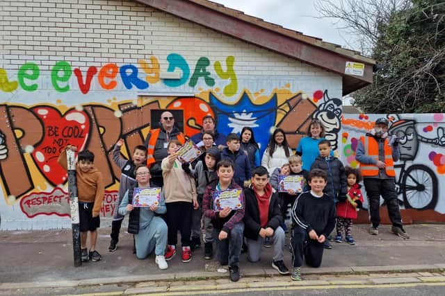 Children getting involved at the latest ECASS community project at Portsea Adventure Playground.