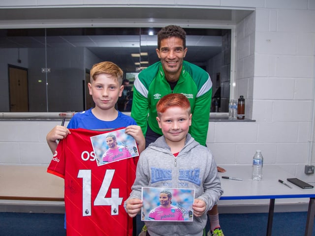 Pictured: David James with Oskar 12 and Joshua 9 at Bay House School, Gosport