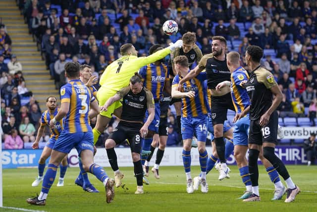 Sean Raggett attempts to connect with a cross into the Shrewsbury penalty area today. Picture: Jason Brown.