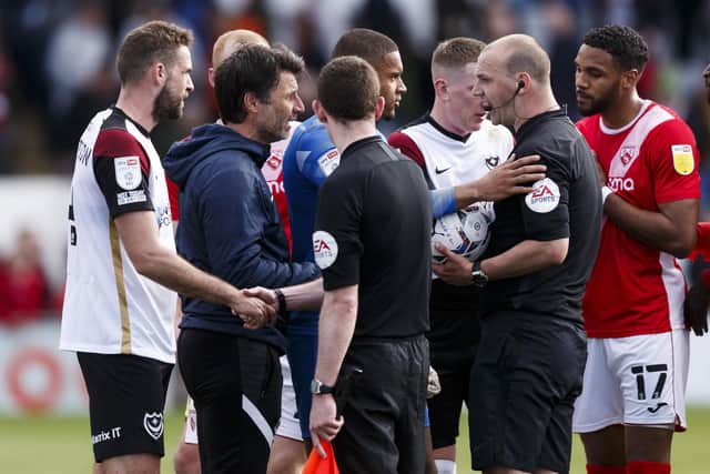 Danny Cowley speaks to referee Bobby Madley after he let Morecambe's late goal stand. (Photo by Daniel Chesterton/phcimages.com)