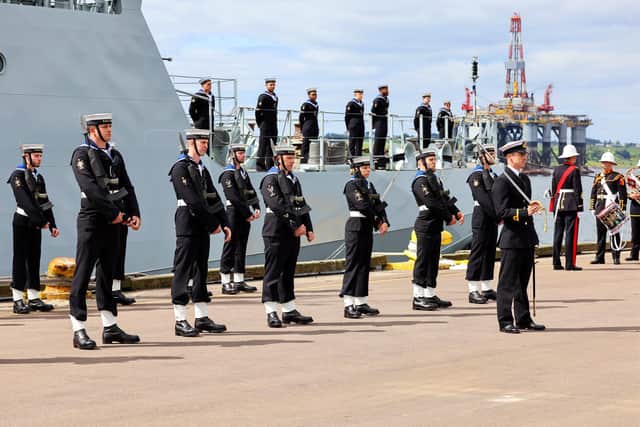 HMS Spey Commissioning Invergordon.

Image shows the ships guard stood at ease during the commissioning service.