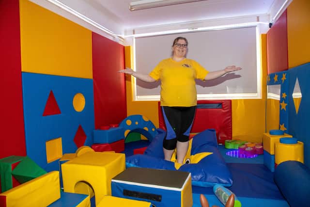 Trustee Becky Ebsworth celebrates the opening of the new Marvels and Meltdowns centre, including a new Sensory Room on Monday morning in Gosport. Photos by Alex Shute