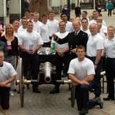 HMS Collingwood field gun team stop for a photograph in Fareham Shopping Precinct at West Street, with Rainbow Centre service secretary Jo Candy, left, and office manager Julie Woodward, after pulling their gun and limber from the naval establishment in Newgate Lane. They were raising sponsorship for the Rainbow Centre in May 2006