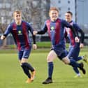 Frankie Paige (foreground) wheels away after scoring for US Portsmouth in their 3-2 Vase third round win over Millbrook in December. Pic: Martyn White.