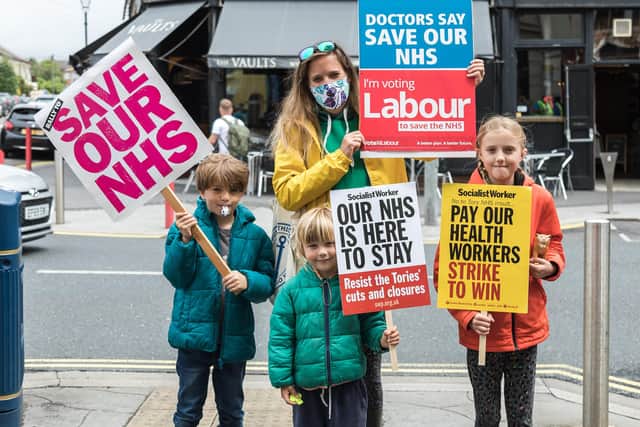 Southsea teacher Helen Toghill (45) with her children Jesse Toghill (8), Asa Toghill (4) and Etta Toghill (10). Picture: Mike Cooter (030721)