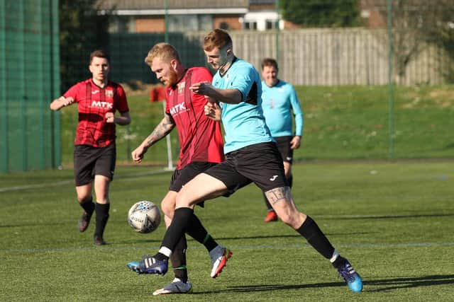 Burrfields (blue) v Horndean United. Picture by Kevin Shipp