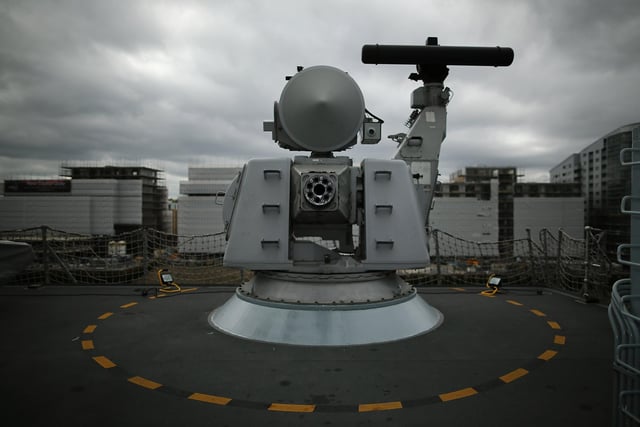 A heavy weapon machine gun is pictured on HMS Illustrious back in May 10, 2013. Photo by Dan Kitwood/Getty Images