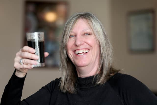 Angie Dunne with a small porter
Picture: Chris Moorhouse     (010320-57)