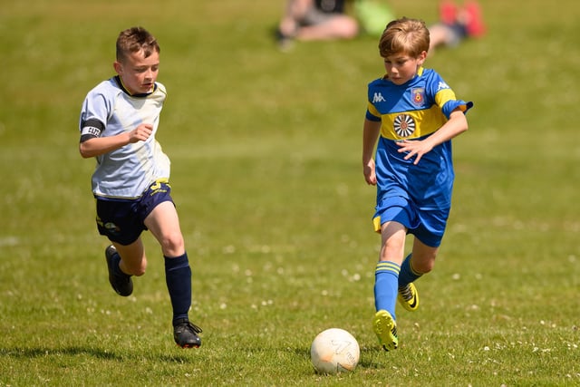 Action from the Clanfield youth football tournament at Horndean Technology College. Picture: Keith Woodland (270521-378)