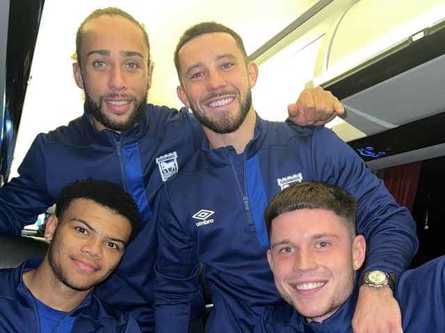 Conor Chaplin joins former Pompey players George Hirst, Dane Scarlett and Marcus Harness to enjoy their win on the way home from Southampton