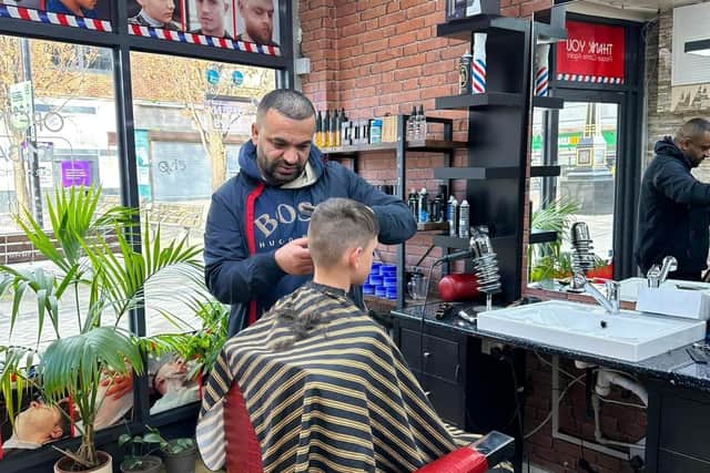 Haji Ali, manager of K1 Barbers, in Waterlooville, has been supported by the community in his plight to offer its services free of charge to Ukrainian refugees and the homeless.