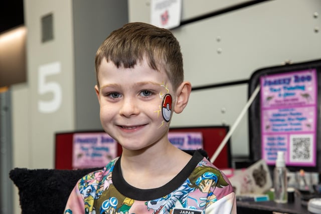Teddy, 7, from Portsmouth, made the most of the face painting on offer.   Photos by Alex Shute