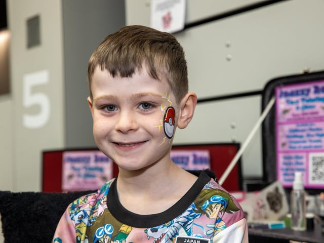 Teddy, 7, from Portsmouth, made the most of the face painting on offer.   Photos by Alex Shute