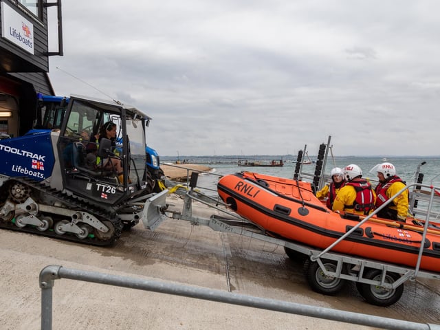 RNLI lifeboats being 'captured' by the specialist vehicles at the Portsmouth Lifeboat Station. Picture: Mike Cooter (310824)