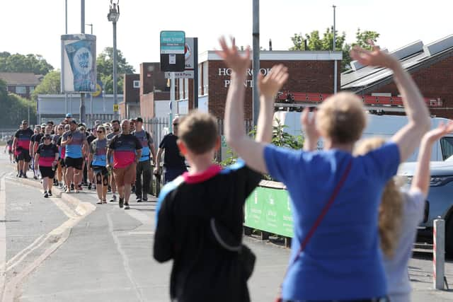 Walkers nearing Rugby Camp at the end of their 80-mile charity trek from London to Portsmouth. Picture: Sam Stephenson