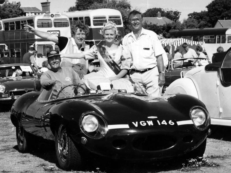 1958 d-type Jaguar replica owner Eric Ansell with Gosporteers rally chairman Pat Doran and carnival queen Clair Lee at Stokes Bay for the Gosport Carnival in 1995. The News PP5609