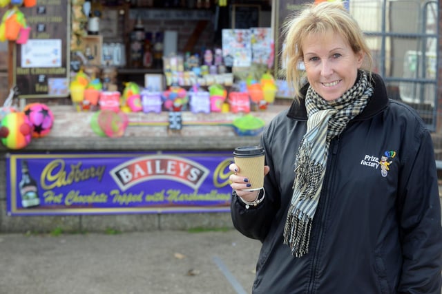 Susan Ling with winter hot chocolate on the Sandhaven Beach promenade in 2020.