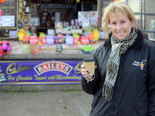 Susan Ling with winter hot chocolate on the Sandhaven Beach promenade in 2020.