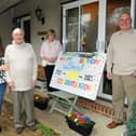 Boris Mayfield from Denmead, celebrated his 100th birthday on Thursday, March 4. Pictured is: (l-r) Boris's niece Tracy Brown with Boris Mayfield and his neighbours Judy and David Clementson. Picture: Sarah Standing (040321-4129)