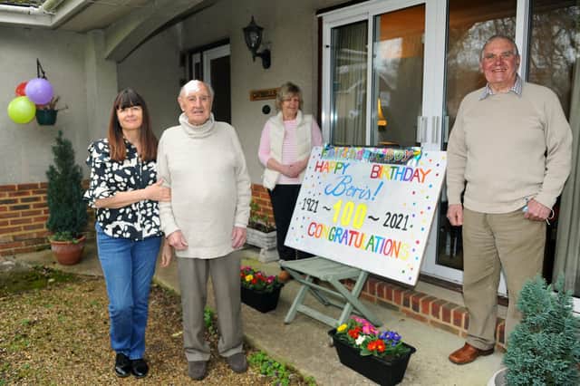 Boris Mayfield from Denmead, celebrated his 100th birthday on Thursday, March 4. Pictured is: (l-r) Boris's niece Tracy Brown with Boris Mayfield and his neighbours Judy and David Clementson. Picture: Sarah Standing (040321-4129)