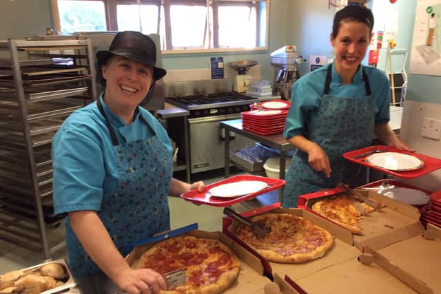 Pizza is served for keyworkers and their family. Picture: Newtown C of E Primary
