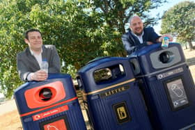 Pictured is: (l-r) Councillors Dave Ashmore, cabinet member for environment and climate change and Steve Pitt, deputy leader of Portsmouth City Council with the some of the new recycling bins that were installed in August.

Picture: Sarah Standing (060820-2040)