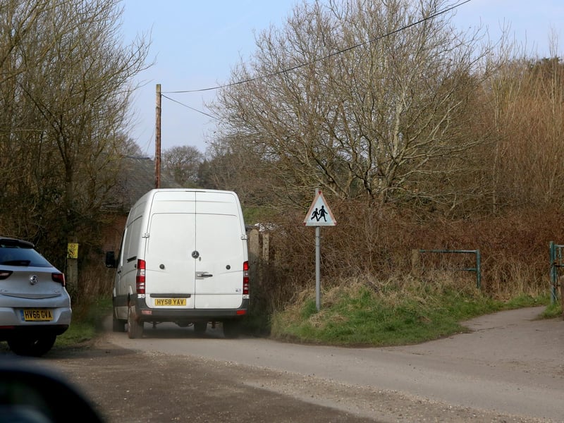 Film crews at the entrance to Little Woodham Village in February 2018, while filming of Doctor Who took place.