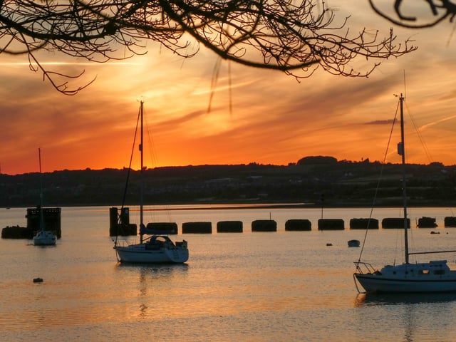 Sunset Over Langstone  by Terry Stubbington