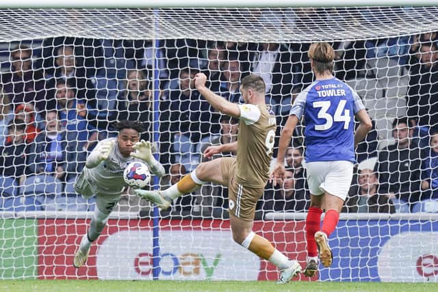 The moment Josh Oluwayemi was clattered by Sam Vokes, subsequently forcing him off with concussion in the 64th minute. Picture: Jason Brown/ProSportsImages