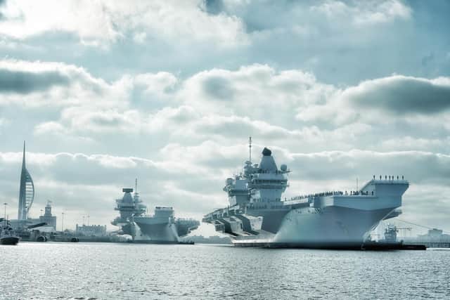 HMS Queen Elizabeth joins HMS Prince of Wales at Portsmouth Naval Base for the first time