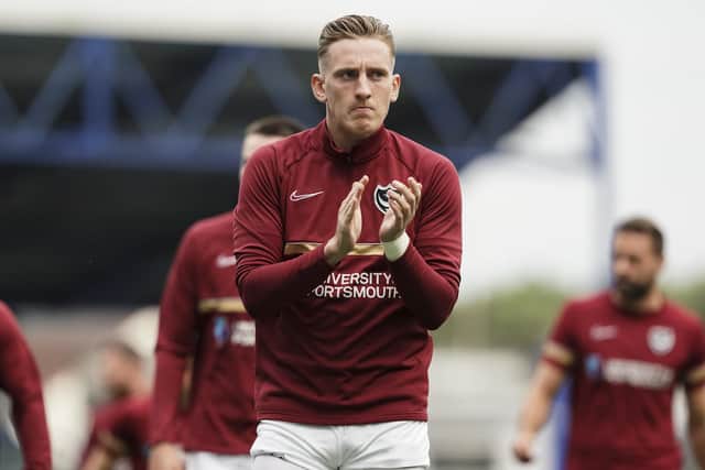 Pompey winger Ronan Curtis applauds the fans ahead of Tuesday night's win against Shrewsbury.  Picture: Jason Brown