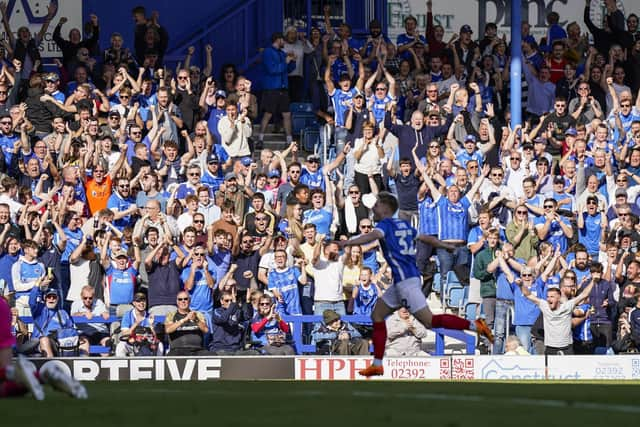 Paddy Lane is loving life at Pompey - the winger celebrating his goal against Lincoln. Pic: Jason Brown.