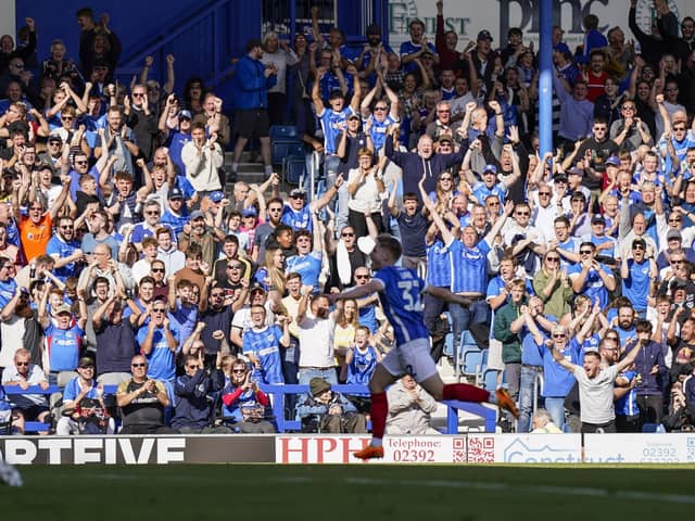 Paddy Lane is loving life at Pompey - the winger celebrating his goal against Lincoln. Pic: Jason Brown.