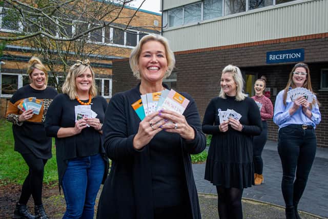 Stop Domestic Abuse staff, Rachel Windebank, Carla Payne, CEO Claire Lambon, Chelsea Haslett, Czarina Jacobs and Paige Merrett with some vouchers outside their office in Havant on 26 November 2020.
Picture: Habibur Rahman