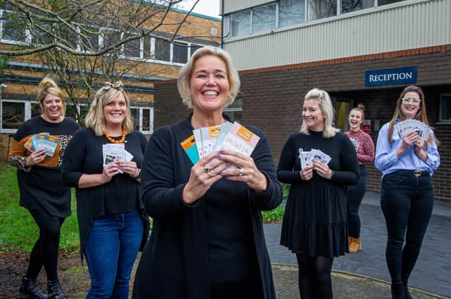 Stop Domestic Abuse staff, Rachel Windebank, Carla Payne, CEO Claire Lambon, Chelsea Haslett, Czarina Jacobs and Paige Merrett with some vouchers outside their office in Havant on 26 November 2020.


Picture: Habibur Rahman