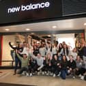 Staff celebrate the opening of New Balance in Gunwharf Quays, Portsmouth   Picture: Chris  Moorhouse (271124-13)