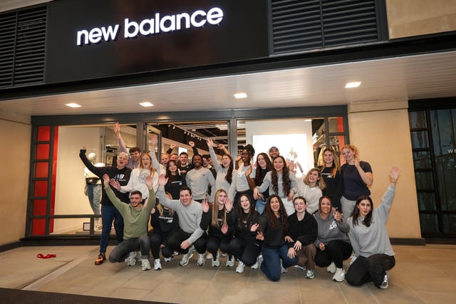 Staff celebrate the opening of New Balance in Gunwharf Quays, Portsmouth   Picture: Chris  Moorhouse (271124-13)