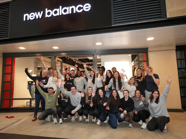 Staff celebrate the opening of New Balance in Gunwharf Quays, Portsmouth Picture: Chris Moorhouse (271124-13)