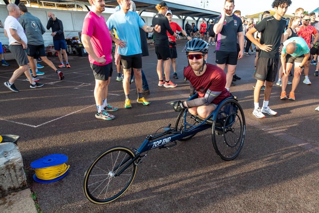 Dale Muffett, paralysed from the waist down, with his adapted bike. Picture: Mike Cooter