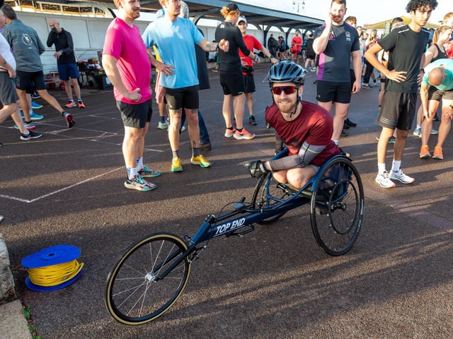 Dale Muffett, paralysed from the waist down, with his adapted bike. Picture: Mike Cooter