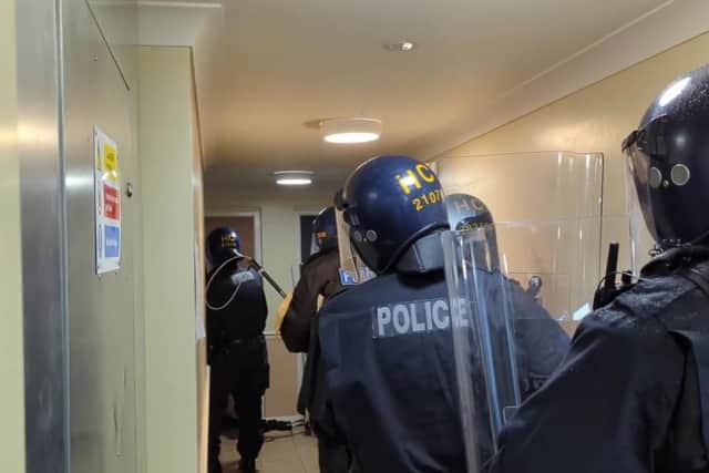 Police storming the flat in Brockhurst Road, Gosport, on the morning of November 16. Picture: Gosport Police.