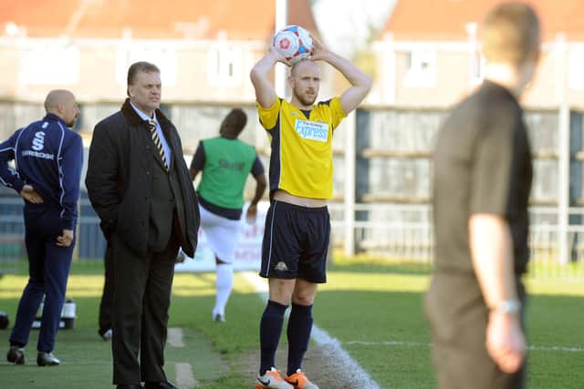 Lee Molyneaux prepares to take a throw in watched by Borough boss Alex Pike against Boreham Wood in 2014. Picture: Paul Jacobs
