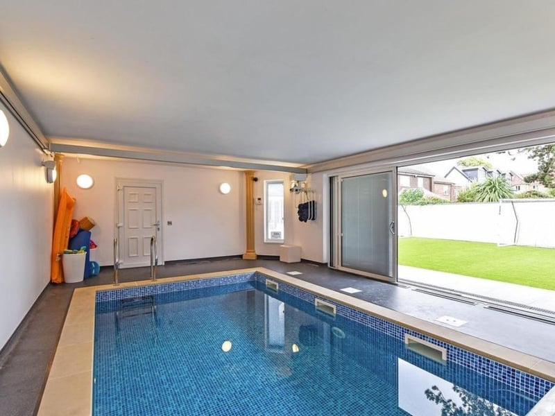 Within this home, there is a large swimming pool area which opens up to the garden - perfect for a summer's day.